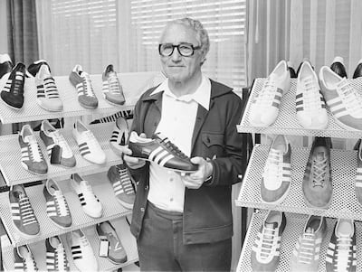 (GERMANY OUT) Dassler, Adolf (Adi) *03.11.1900-06.09.1978+Unternehmer, Gruender der Firma 'adidas', D- Portrait mit adidas - Sportschuhen - 25.09.1973 (Photo by Brauner/ullstein bild via Getty Images)