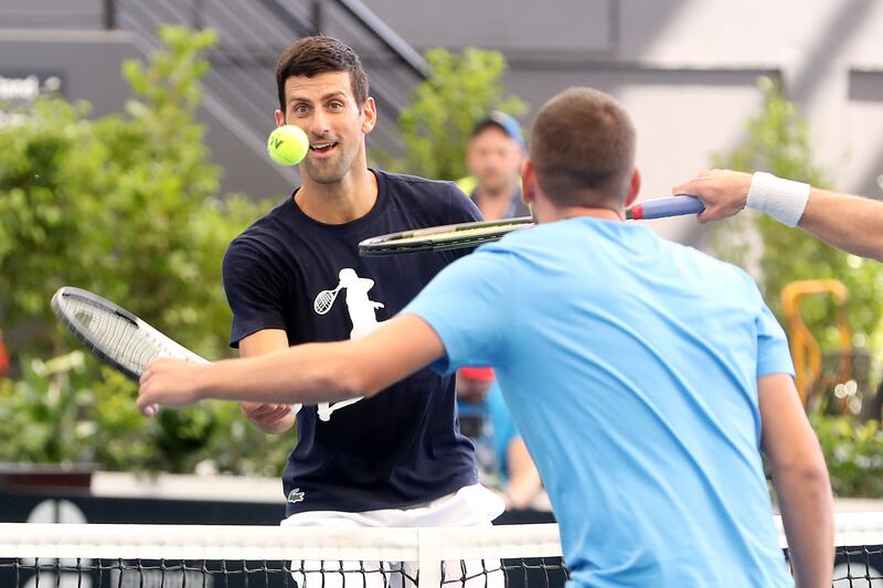 Novak Djokovic warms up during a practice session ahead of the 2023 Adelaide International. Getty