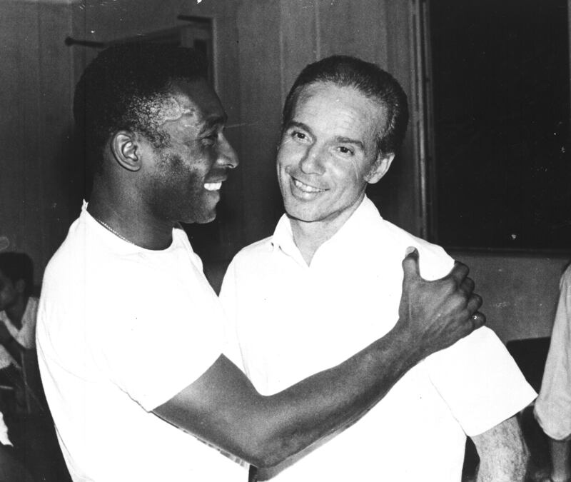 Brazil star Pele, left, embraces Mario Zagallo after the latter's appointment as coach of the Brazilian national team, in Rio De Janeiro, Brazil, in March 1970. AP