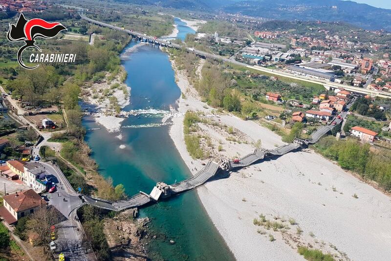 This aerial photograph provided by the Italian Carabinieri police on  shows a collapsed bridge in Aulla, between the regions of Tuscany and Liguria, northern Italy.  AP