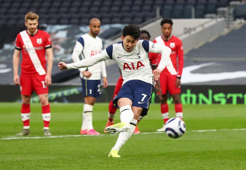 Soccer Football - Premier League - Tottenham Hotspur v Southampton - Tottenham Hotspur Stadium, London, Britain - April 21, 2021 Tottenham Hotspur's Son Heung-min scores their second goal from the penalty spot Pool via REUTERS/Clive Rose EDITORIAL USE ONLY. No use with unauthorized audio, video, data, fixture lists, club/league logos or 'live' services. Online in-match use limited to 75 images, no video emulation. No use in betting, games or single club /league/player publications.  Please contact your account representative for further details.