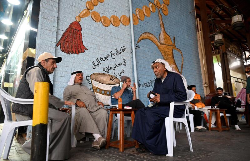 Customers sit in a coffee shop at Souk Al Mubarakiya traditional market, Kuwait City, Kuwait. EPA