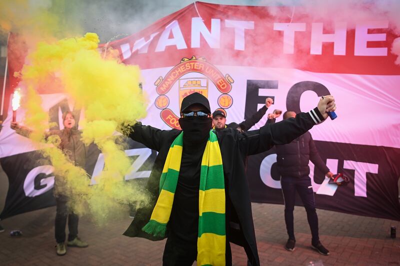 Fans protesting against the Glazer's ownership are seen outside Old Trafford prior to a Premier League match against Liverpool in May 2021