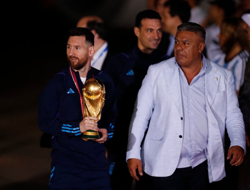 Lionel Messi with Claudio Tapia, president of the Argentine Football Association. Reuters