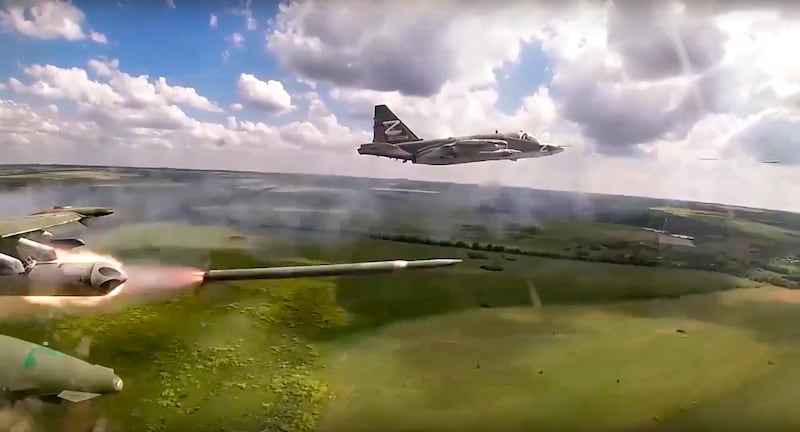 A Russian Su-25 ground attack jet fires rockets on a mission in an undisclosed location in Ukraine. Russia's air campaign so far has been half-hearted and ineffectual. AP