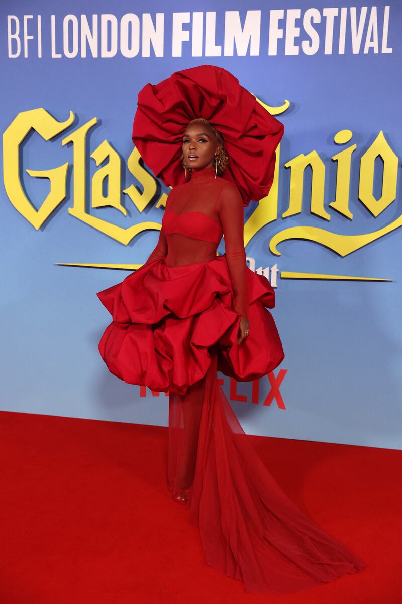 Janelle Monae wears red Christian Siriano. AFP 