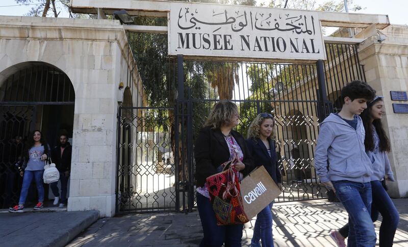 Visitors leave the national antiquities museum in the Syrian capital Damascus after visiting it on October 28, 2018.  Syria reopened a wing of the capital's famed antiquities museum today after six years of closure to protect its exhibits from the civil war. / AFP / LOUAI BESHARA
