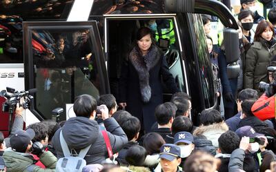 FILE - In tis Sunday, Jan. 21, 2018, file photo, North Korean Hyon Song Wol, head of North Korea's art troupe, gets off a bus as she arrives at the Seoul Train Station in Seoul, South Korea. Hyon, the photogenic leader of Kim Jong Un's hand-picked Moranbong Band, has made two excursions across the Demilitarized Zone as a negotiator and advance team leader working out the details of Kim's surprise offer for the North to participate in the Pyeongchang Games. South Korea's media have been treating her like a true K-pop celebrity. (Kim Sun-ung/Newsis via AP, File)