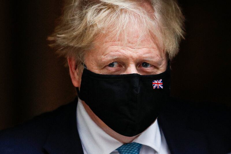 UK Prime Minister Boris Johnson leaves Downing Street in London on Wednesday. Reuters