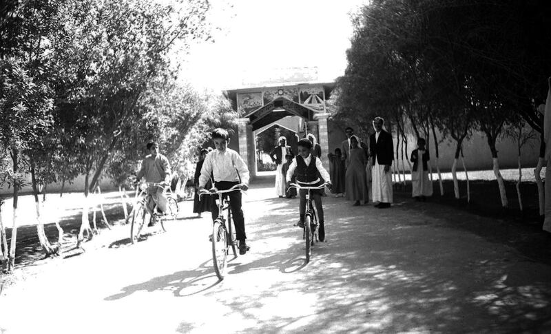 The future President and Ruler of Abu Dhabi cycles with relatives in the 1960s. Some of the National Archives images of Sheikh Mohamed have rarely been seen before. Photo: National Archives