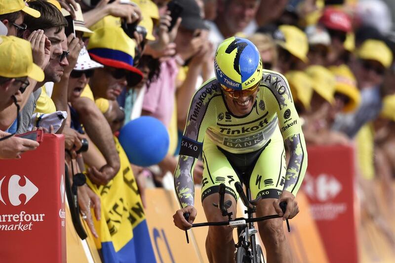 Spain's Alberto Contador crosses the finish line at the end of the individual time trial first stage of the 2015 Tour de France on Saturday. Eric Feferberg / AFP