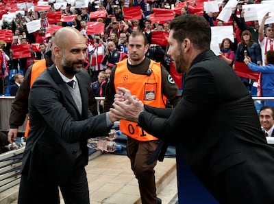Pep Guardiola, left, then manager of Bayern Munich, shakes hands with his Atletico Madrid counterpart Diego Simeone ahead of their Champions League semi-final first-leg in 2016. Getty