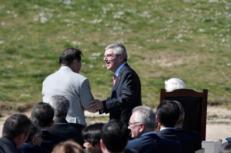 International Olympic Committee (IOC) president Thomas Bach speaks with Paralympic Games vice president Toshiaki Endo. AFP