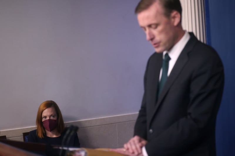 Ms Psaki watches as US National Security Adviser Jake Sullivan takes part in a news briefing about the situation in Afghanistan. Reuters