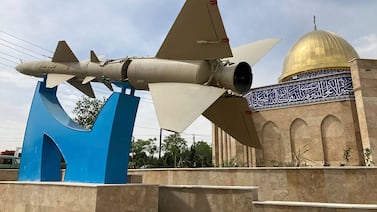A missile on display with an anti-Israel sign on it in Quds town, west of the Iranian capital Tehran. AP