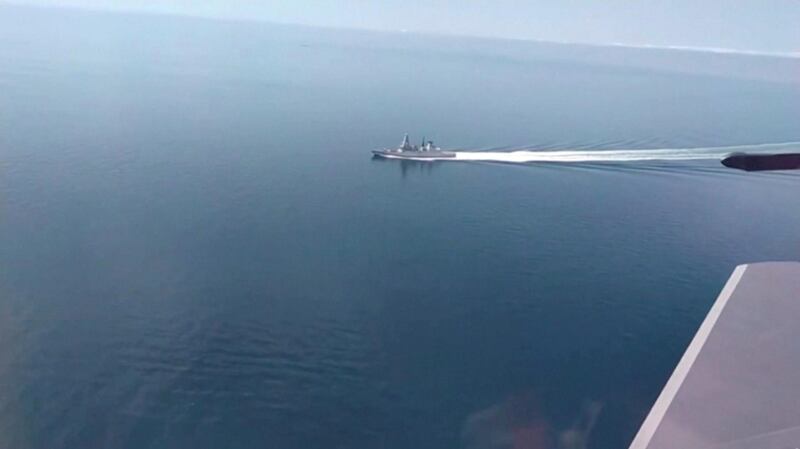 A still image taken from a video released by Russia's Defence Ministry allegedly shows British Royal Navy's Type 45 destroyer HMS Defender filmed from a Russian military aircraft in the Black Sea, June 23, 2021. Ministry of Defence of the Russian Federation/Handout via REUTERS ATTENTION EDITORS - THIS IMAGE WAS PROVIDED BY A THIRD PARTY. NO RESALES. NO ARCHIVES. MANDATORY CREDIT.