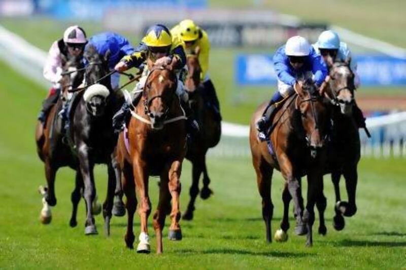 Joe Fanning rides Universal to victory in the Princess Of Wales's Stakes at Newmarket.