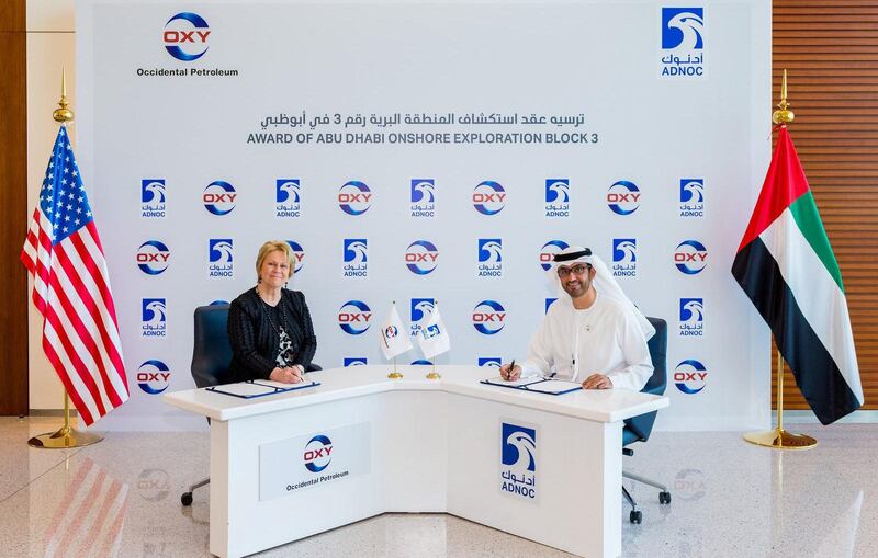 Dr Sultan Al Jaber, ADNOC Group CEO, and Vicki Hollub, CEO of Occidental signing documents. Courtsey: Adnoc

