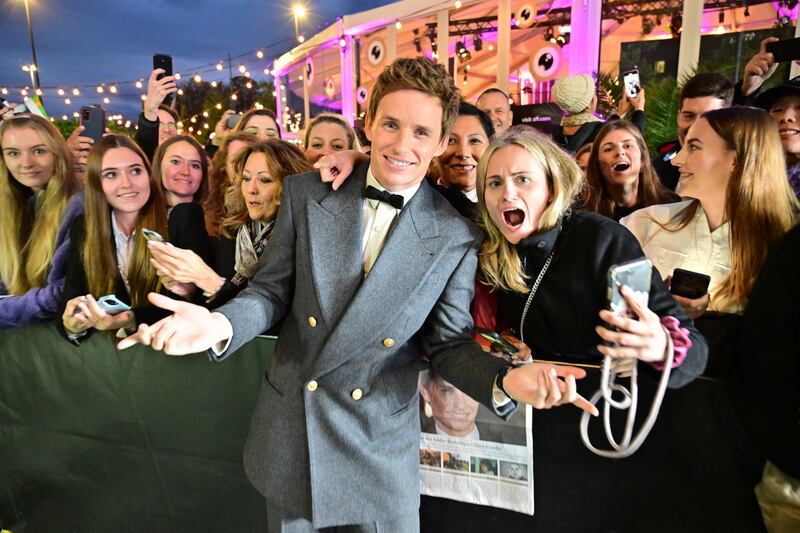 Eddie Redmayne poses with fans at the premiere of 'The Good Nurse' at the Zurich Film Festival in Switzerland. Getty Images