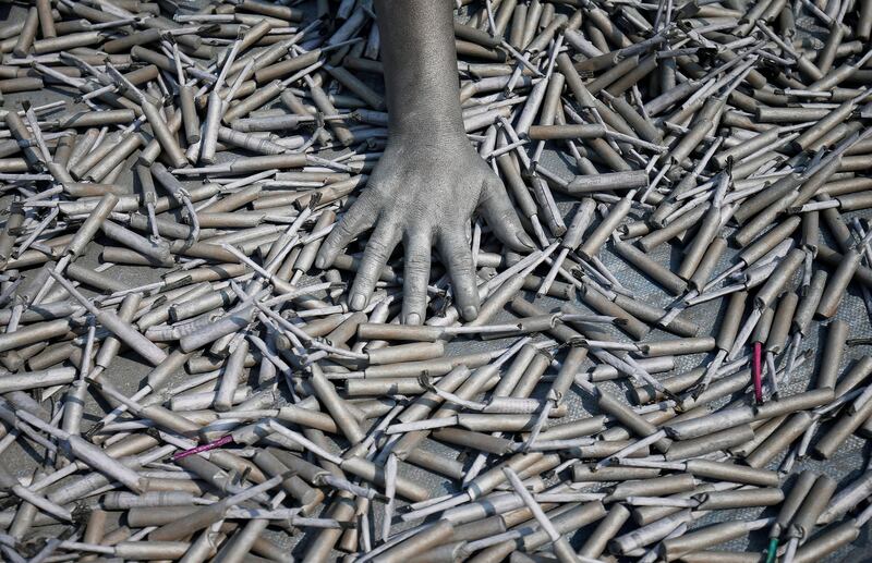 A worker checks the dryness of firecrackers at a factory in Ahmedabad ahead of Diwali in India. Amit Dave / Reuters