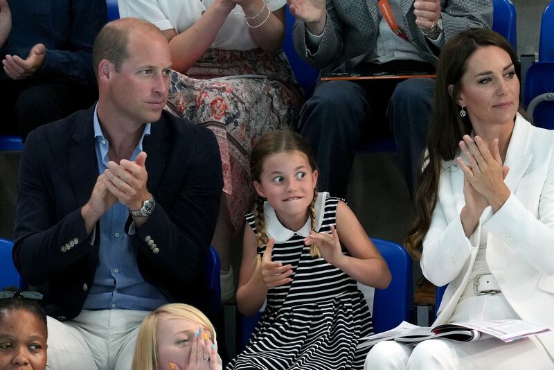 Princess Charlotte with her parents at Sandwell Aquatics Centre on Day 5 of the 2022 Commonwealth Games in Birmingham. PA