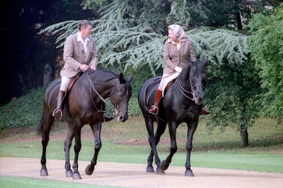 Ronald Reagan, US president at the time, rides with Queen Elizabeth at Windsor Castle near London on June 8, 1982. Reuters