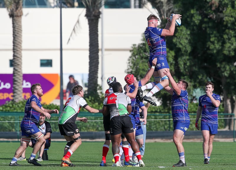 Jebel Ali Dragons win a lineout against Abu Dhabi Harlequins during the West Asia Premiership game. Victor Besa / The National
