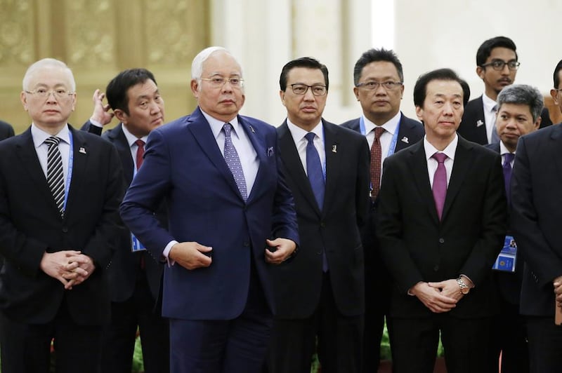 Malaysian prime minister Najib Razak (3rd-L) waits to meet Chinese president Xi Jinping ahead of the Belt and Road Forum in Beijing. Jason Lee / AFP 

