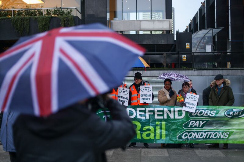 Members of the RMT on a picket line outside London Euston station. Bloomberg