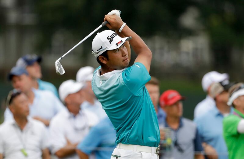 Hideki Matsuyama of Japan, watches his tee shot on the 17th hole during the second round of the PGA Championship golf tournament at the Quail Hollow Club Friday, Aug. 11, 2017, in Charlotte, N.C. (AP Photo/Chris O'Meara)