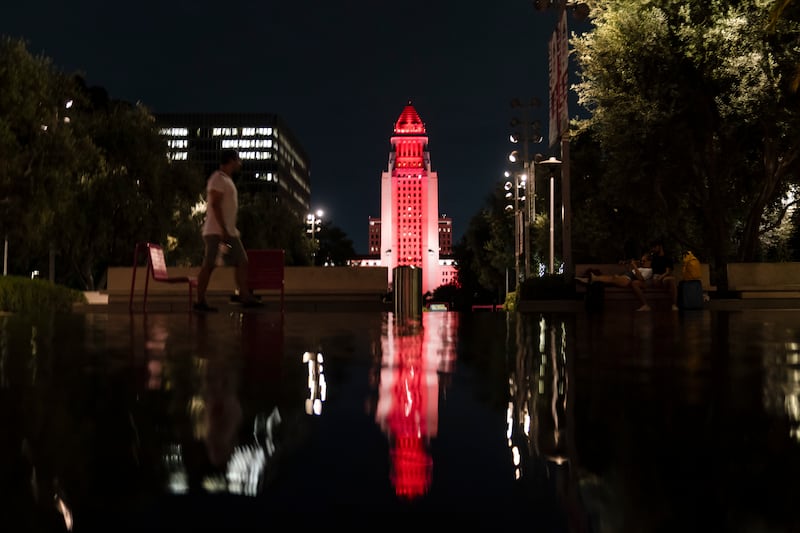 Los Angeles City Hall is illuminated in red and blue to honour Queen Elizabeth. The queen visited the state in 1983. AP