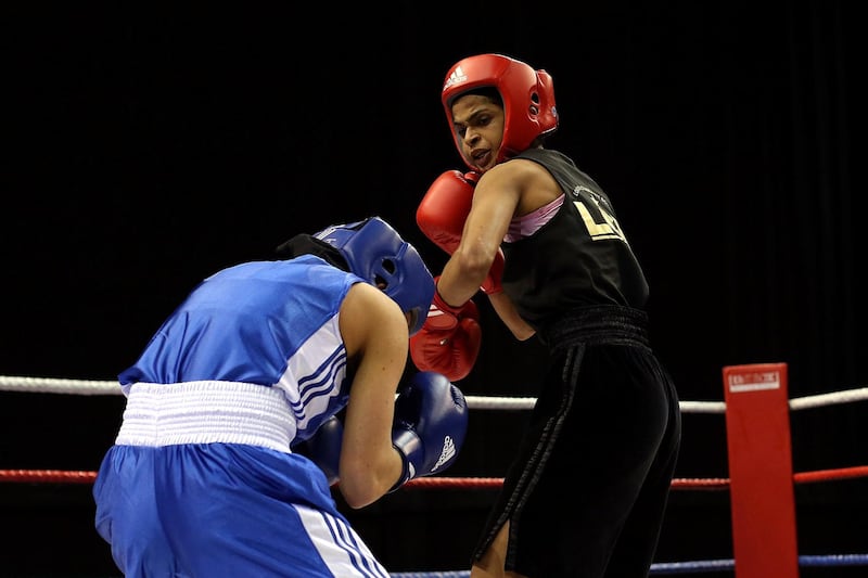 LIVERPOOL, ENGLAND - APRIL 29:  Ramla Ali(red) in action against Chloe Jade Pearce in their 54kg fight during day one of the Boxing Elite National Championships at Echo Arena on April 29, 2016 in Liverpool, England.  (Photo by Jan Kruger/Getty Images)