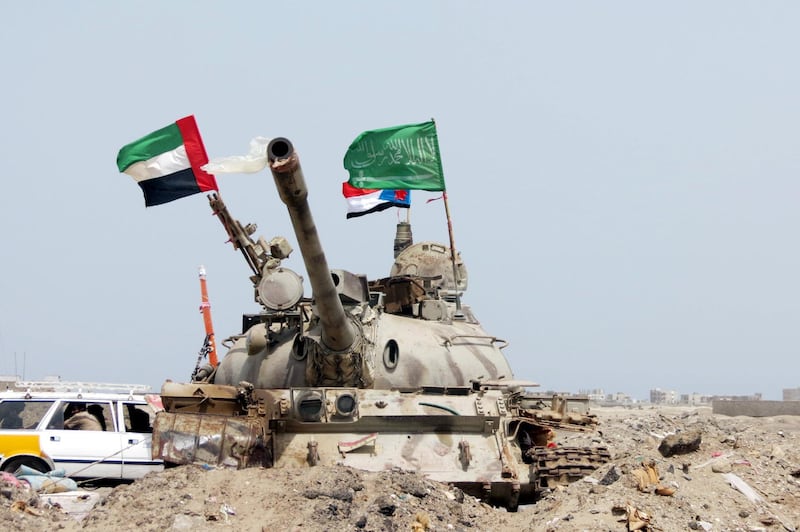 CAPTION CORRECTION
Mandatory Credit: Photo by NAJEEB ALMAHBOOBI/EPA-EFE/Shutterstock (10330392j)
UAE and Saudi flags flap on a tank as UAE troops take part in military operations against the Houthi rebels in the southern port city of Yemen, 8 August 2015 (Issued on 08 July 2019). According to reports, the United Arab Emirates (UAE) on 08 July 2019 announced a partial military withdrawal from war-torn Yemen, more than four years after it participated in the Saudi-led military coalition against the Houthi rebels in Yemen. The UAE is a key partner in the coalition which intervened in Yemen in March 2015 to back the internationally recognized government of Yemen against Iran-aligned Houthi rebels.
UAE troops withdraw from war-torn Yemen, Aden - 08 Jul 2019
CAPTION CORRECTION - correcting caption to read 'a tank' (not: UAE tank)
