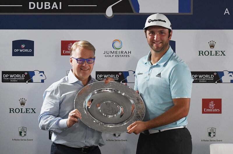 DUBAI, UNITED ARAB EMIRATES - NOVEMBER 14:  Jon Rahm of Spain is presented with the Rookie of the Year award by European Tour Chief Executive Keith Pelley during the Pro-Am prior to the DP World Tour Championship at Jumeirah Golf Estates on November 14, 2017 in Dubai, United Arab Emirates.  (Photo by Ross Kinnaird/Getty Images)