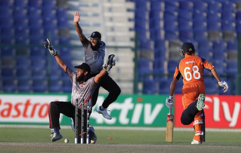 Two Netherlands players were run out during their defeat against the UAE at the World Twenty20 in Abu Dhabi yesterday. Delores Johnson / The National
