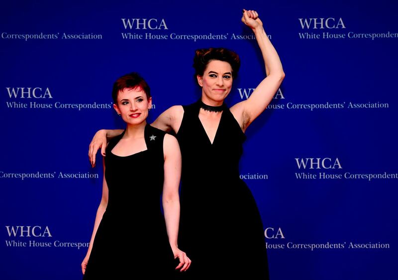 US singer Amanda Palmer and English screenwriter Laurie Penny arrive on the red carpet for the White House Correspondents' Dinner in Washington, DC on April 27, 2019. AFP