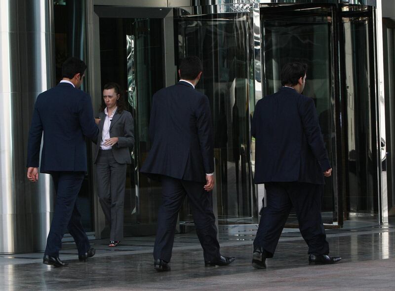DUBAI - MAY 12,2010  - Office workers at Dubai International Financial Centre in Dubai. ( Paulo Vecina/The National )