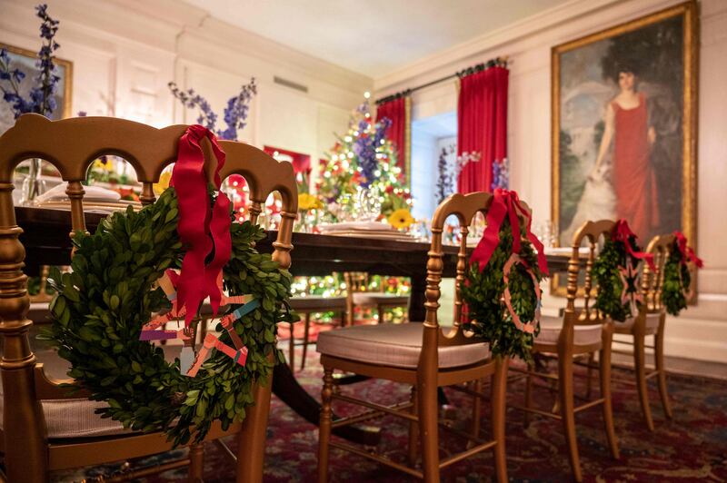 Wreaths have been placed on the backs of chairs in the China room. AFP