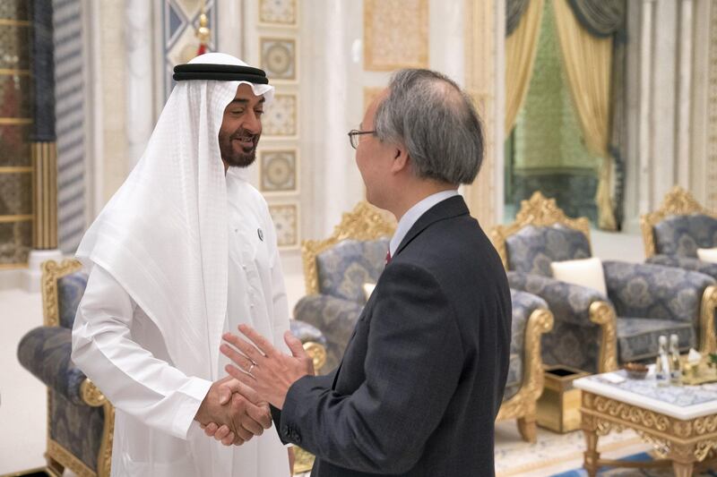 ABU DHABI, UNITED ARAB EMIRATES - May 20, 2018: HH Sheikh Mohamed bin Zayed Al Nahyan Crown Prince of Abu Dhabi Deputy Supreme Commander of the UAE Armed Forces (L), receives HE Kanji Fujiki, Ambassador of Japan to the UAE (R), during an iftar reception at the Presidential Palace. 

( Hamad Al Kaabi / Crown Prince Court - Abu Dhabi )
---