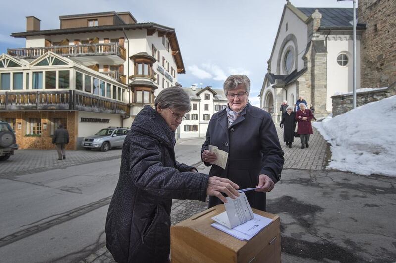 Swiss voters cast ballots 12 February whether to make it easier for third-generation foreigners to receive Swiss citizenship. There was also a referendum on abolishing preferential tax rates for certain companies and a third refenrdum in the canton of Graubuenden on the bid for the 2026 Winter Olympic Games. Benjamin Manser/EPA