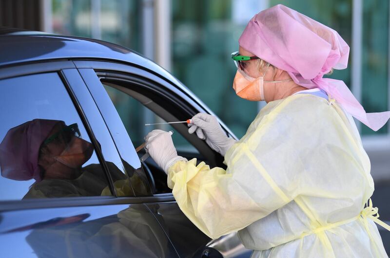 Nurse Shirley Molloy tests a patient for COVID-19 at a drive-through Fever Clinic in Caloundra on the Sunshine Coast, Australia. The Queensland Government has announced that some restrictions will be eased starting 02 May 2020 due to a very low number of new COVID-19 infections.  EPA