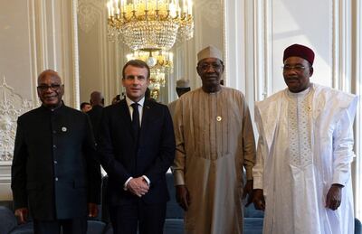 epa07991198 French President Emmanuel Macron (2-L) poses with Mali's President Ibrahim Boubacar Keita (L), Chad's President Idriss Deby (2-R) and Niger's President Mahamadou Issoufou (R) at the Elysee Palace as part of the Paris Peace Summit 2019 in Paris, France, 12 November 2019. The international event on global governance issues and multilateralism takes place from 12 to 13 November in Paris.  EPA/JOHANNA GERON / POOL  MAXPPP OUT