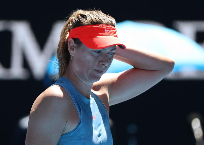 Tennis - Australian Open - Fourth Round - Melbourne Park, Melbourne, Australia, January 20, 2019. Russia's Maria Sharapova reacts during the match against Australia's Ashleigh Barty. REUTERS/Lucy Nicholson