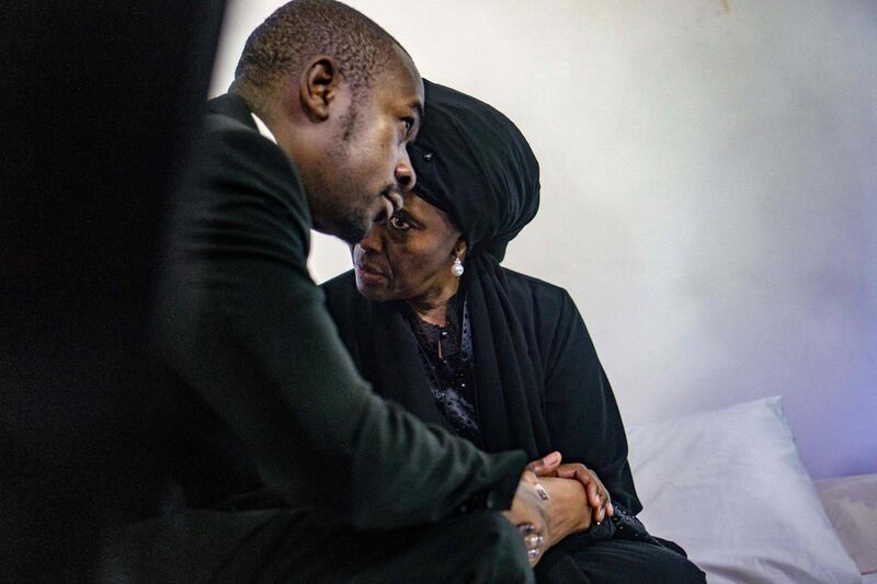 Movement for Democratic Change opposition party leader Nelson Chamisa (L) offers his condolences to Zimbabwe's former first lady Grace Mugabe, as the body of late president Robert Mugabe lies in state at the Mugabe's residency in Harare.   AFP