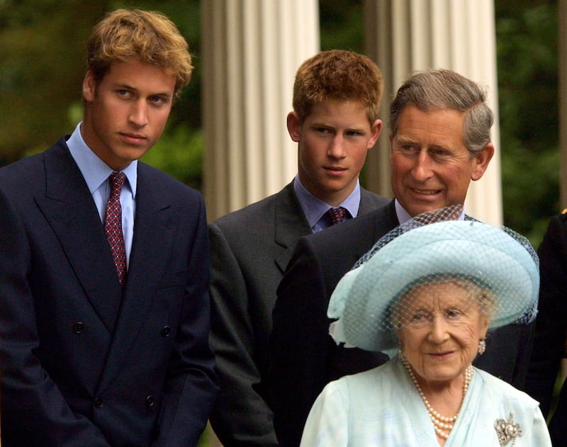 2001: Prince William, Prince Harry and Prince Charles appear with the Queen Mother during celebrations to mark her 101st birthday in London. Getty Images