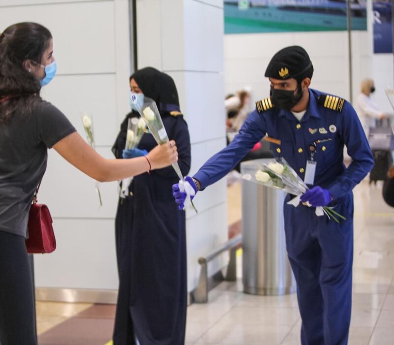 Passengers from Beirut were presented with flowers upon arrival at Dubai International Airport last night. Courtesy: Dubai Customs