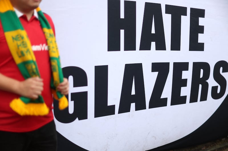 A banner protesting the Glazer family’s ownership of Manchester United outside the stadium before the match. Action Images