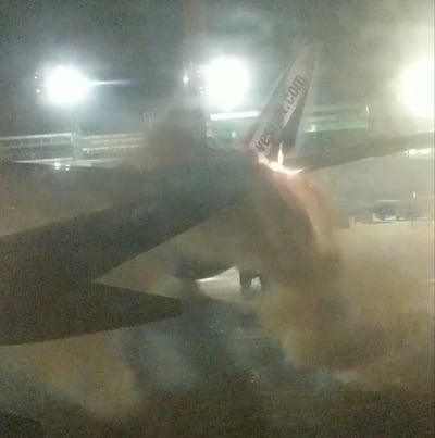 An explosion is seen through a window of a plane that has collided with another plane at Toronto's Pearson Airport, Canada, January 5, 2018 in this still image taken from social media video. @STEPHEN_BELFORD/via REUTERS THIS IMAGE HAS BEEN SUPPLIED BY A THIRD PARTY. MANDATORY CREDIT.NO RESALES. NO ARCHIVES