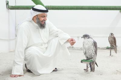 Portrait of Kuwaiti falconer Bader Muhareb Al Deeri, in Kabd, Kuwait.