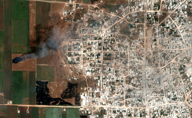 Smoke from fires in Hbit, Idlib Province,.
